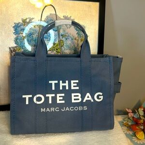 NWT Marc Jacobs the tote blue shadow color. Crossbody canvas tote.